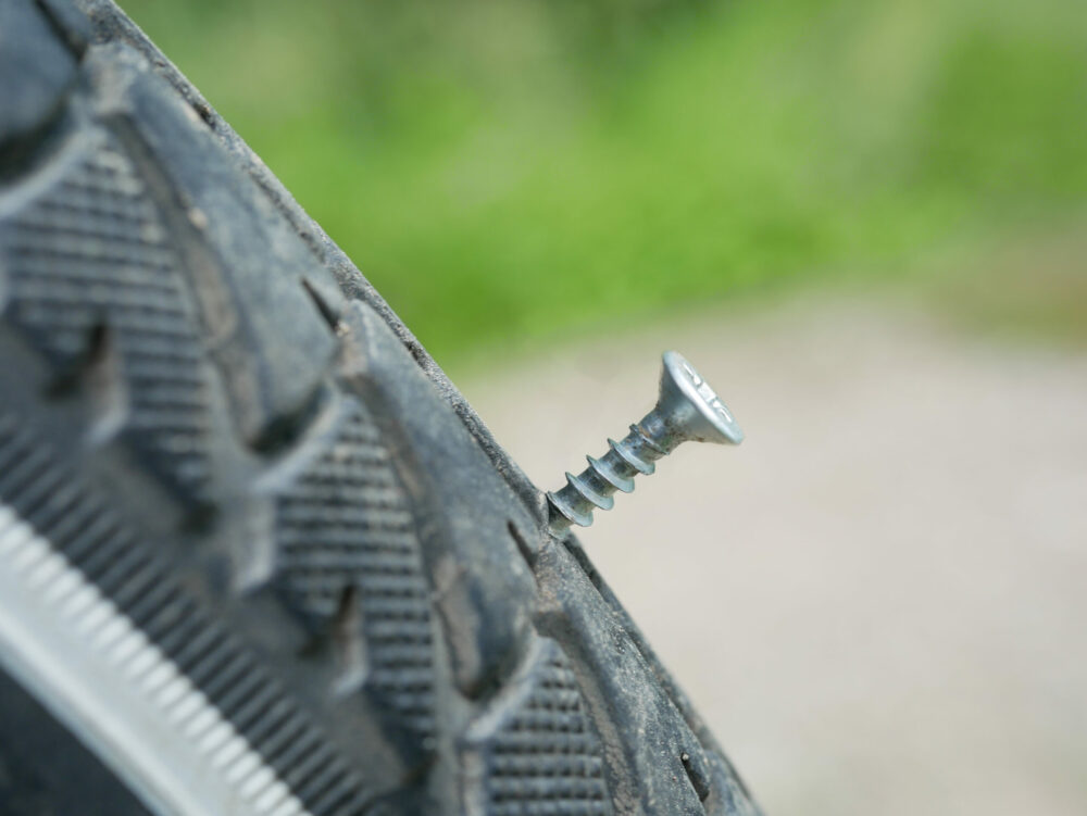 closeup shot nail wheel bicycle scaled e1709810752614